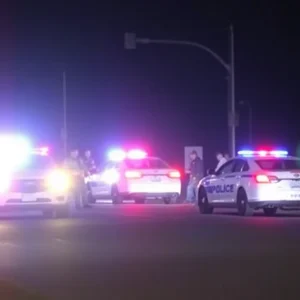 Police cars and emergency responders at an incident location in Austin