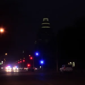 Aerial view of Austin at night with police activity visible