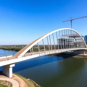 Construction of wishbone-shaped pedestrian bridge over Lady Bird Lake in Austin