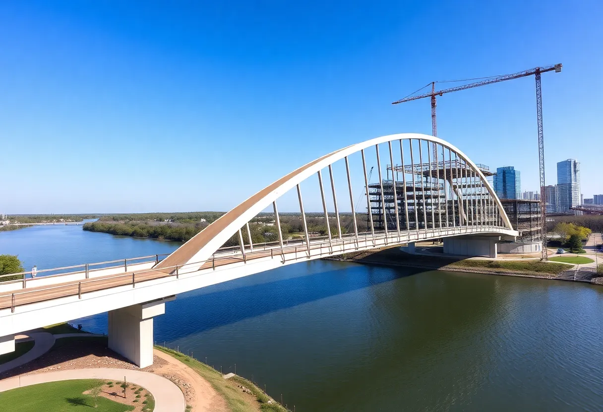 Construction of wishbone-shaped pedestrian bridge over Lady Bird Lake in Austin