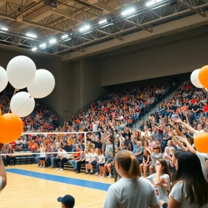 Fans cheering during the Texas Longhorns volleyball match against Stanford