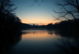 Lake at dusk reflecting the twilight sky, representing local concerns.