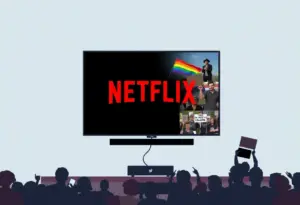 Conceptual image of a Netflix screen showing LGBTQ+ themes amidst protest signs.