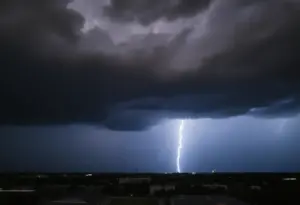 Dark storm clouds and lightning over the city of Austin during a thunderstorm.