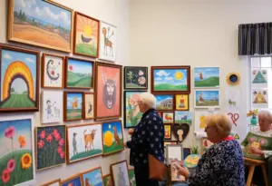 Colorful artworks created by students displayed in Community First Village