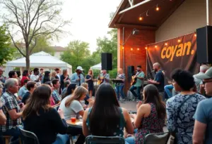 Engaged audience at the Open Mic: VORTEX Voices event with performers on stage.