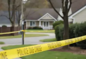 Police at a suburban neighborhood crime scene in Austin