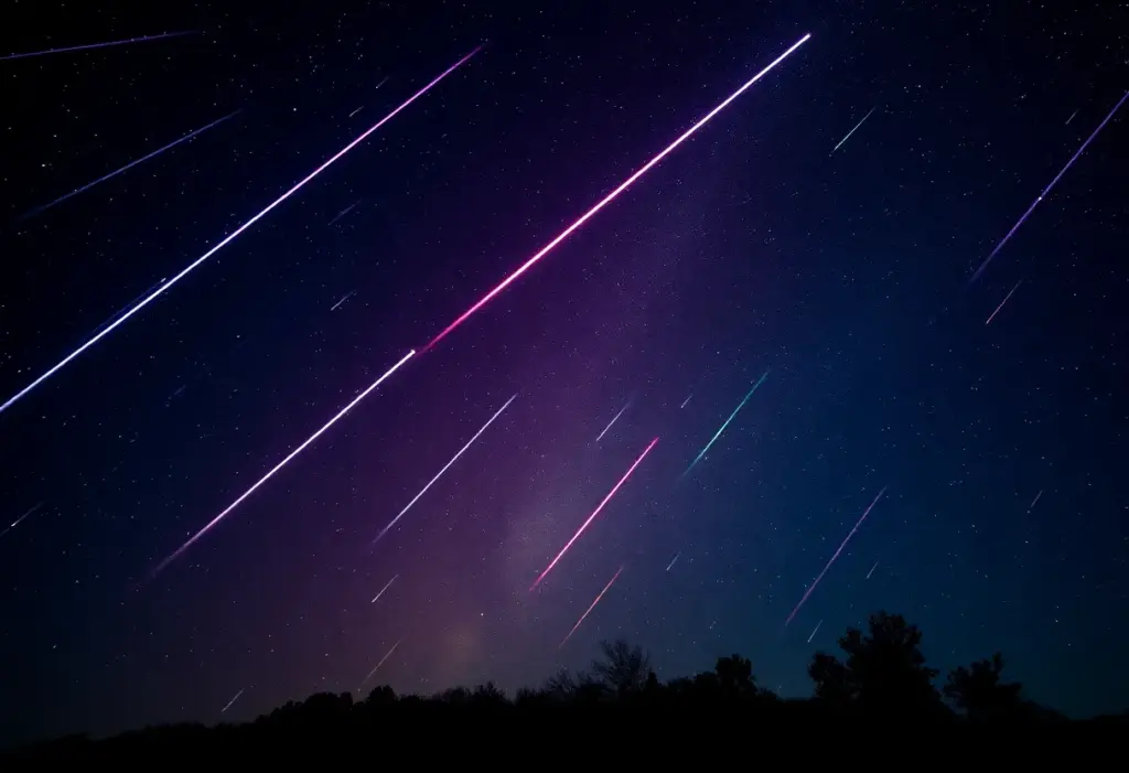 A night sky displaying the Geminid meteor shower above Austin, Texas.