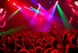 A concert crowd enjoying a live music performance at the Moody Center.