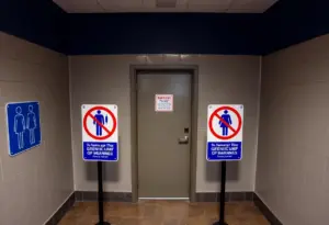 Illustration depicting the enforcement challenges of the Texas Bathroom Bill.