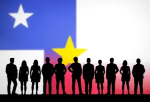 Silhouettes representing gender identities against the Texas flag