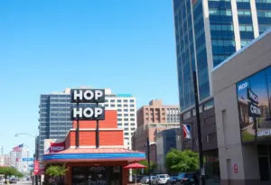Image of the downtown Austin IHOP restaurant in a bustling urban environment.