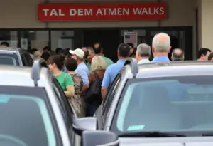 A line of people at the Texas DMV for vehicle registration