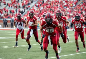 Texas Tech football players on the field during a game